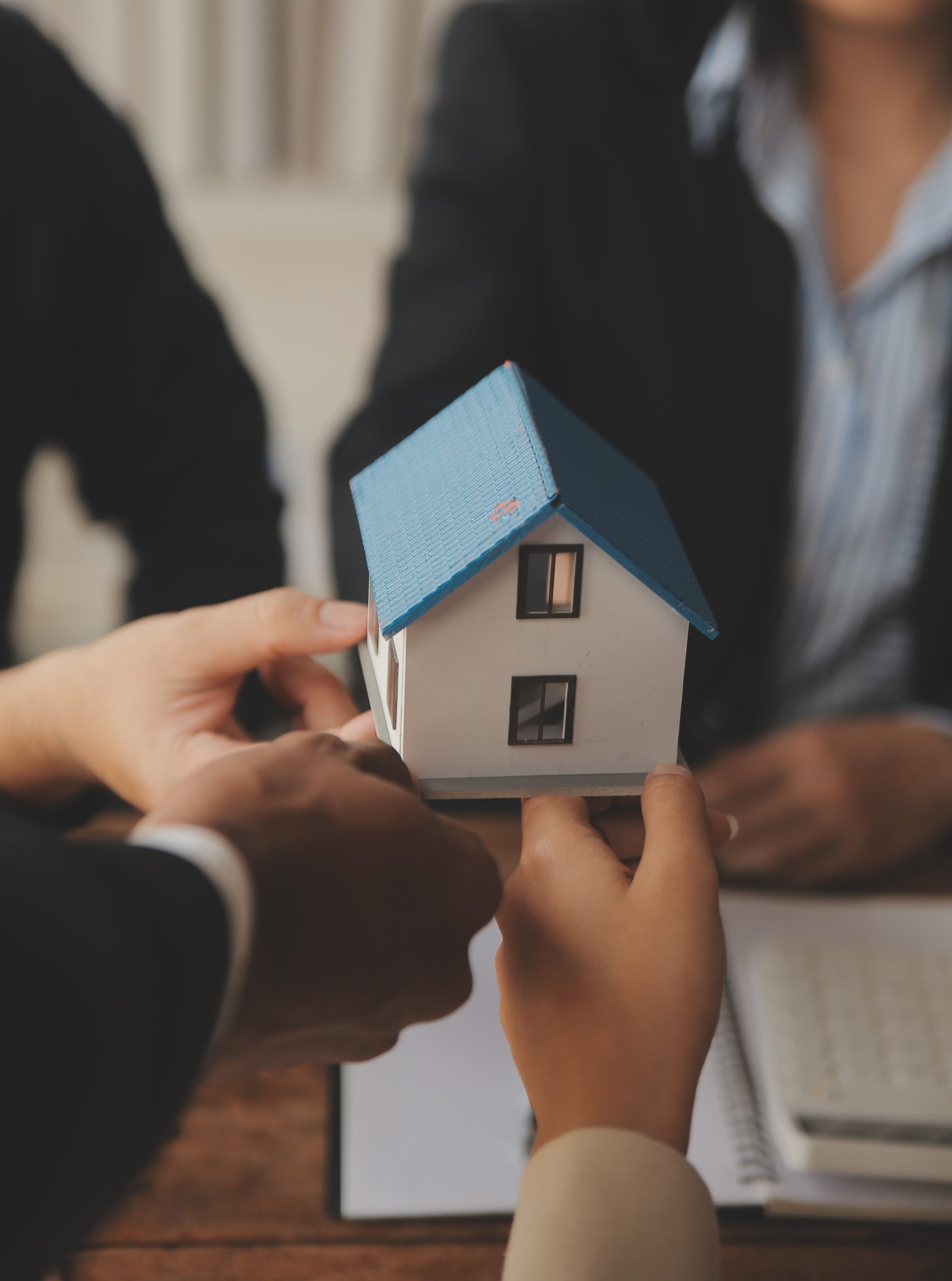 Real estate agent and Sales manager team analysis pricing of rental lease contract of sale purchase agreement, concerning mortgage loan offer for and house insurance.