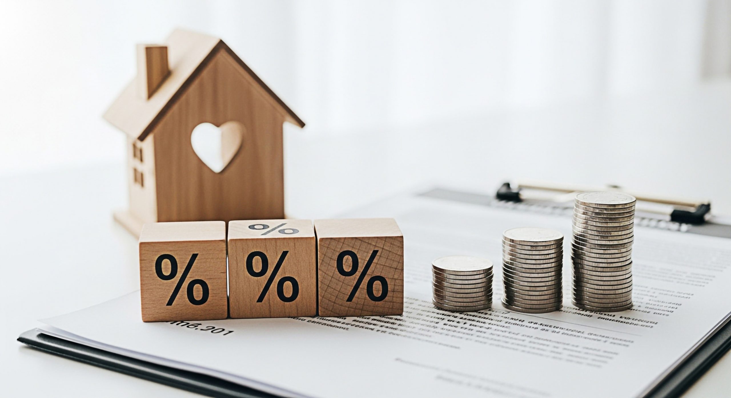 Homebuyer calculating payments showing Interest Rate Impact